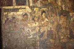 Ajanta Cave 2, hall, left wall. Bhagvatprasuti, EPISODES 7, 9. Episode 7 (left): 'At the royal court, preparations are made for the excursion (?)' Episode 9 (centre): 'In the grove of Lumbini, Maya, who is accompanied by two maidservants, has seized the branch of a tree, and gods Indra and Brahma have recieved the newborn.' (#65, Schlingloff 2013, vol. I, 376-77)