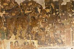 Ajanta Cave 2, hall, right wall. Purna, EPISODE 9: 'Outside the monastery, the Buddha, who with his monks has come flying through the air to Purna's hometown, is being welcomed by the townspeople with offerings.' Below left: episode 1. (#79, Schlingloff 2013, vol. I, 449)